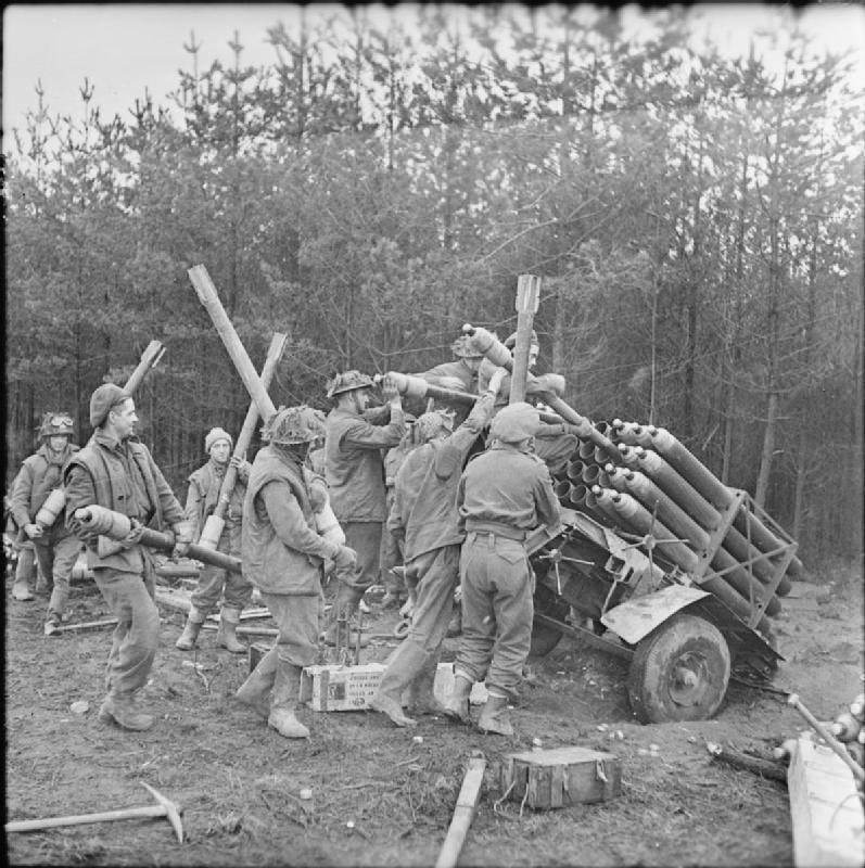 British soldiers loading rockets at Reichswald, 8 February 1945